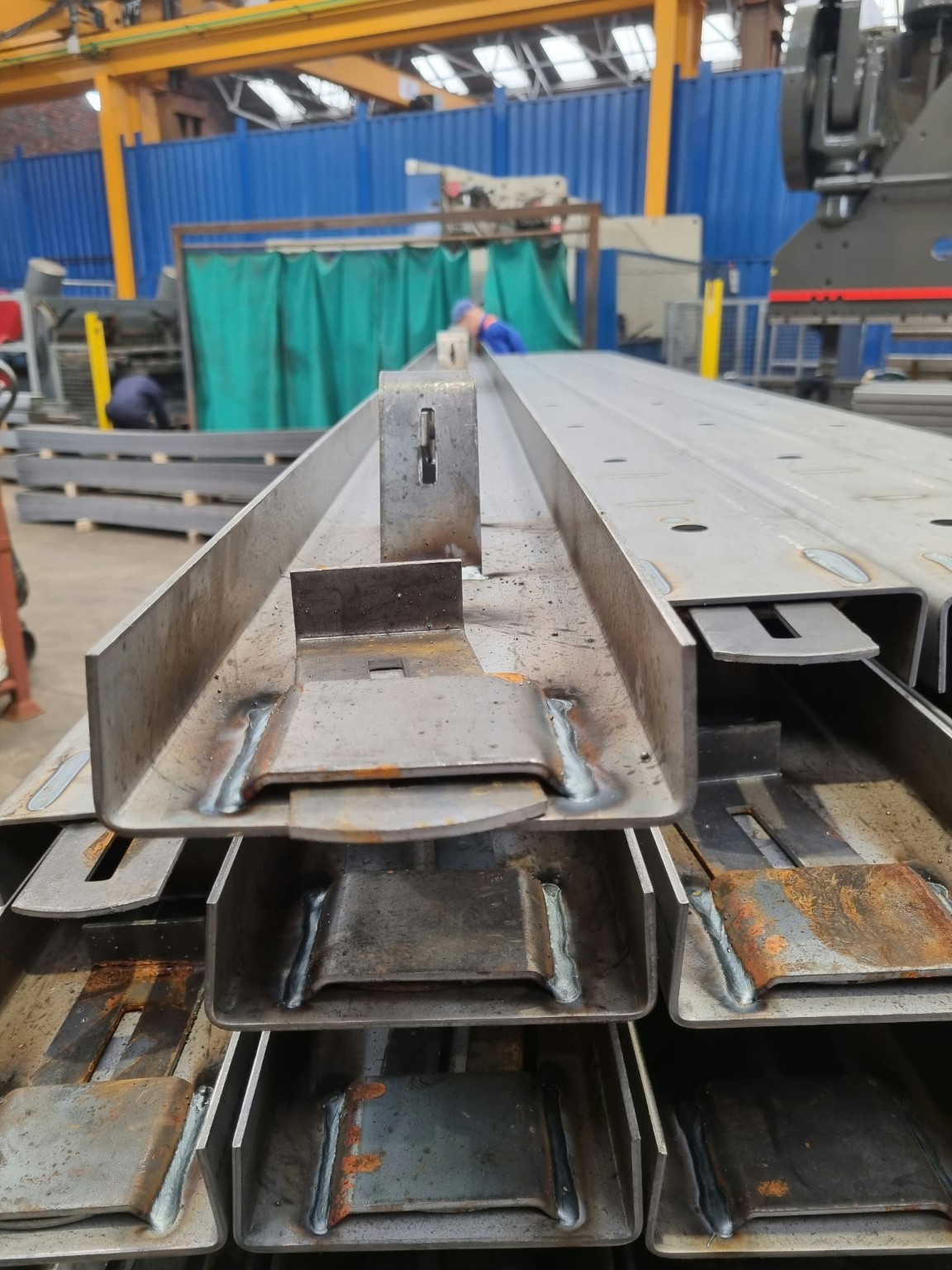 Rigid steel road forms showing welded strengthening and joining components