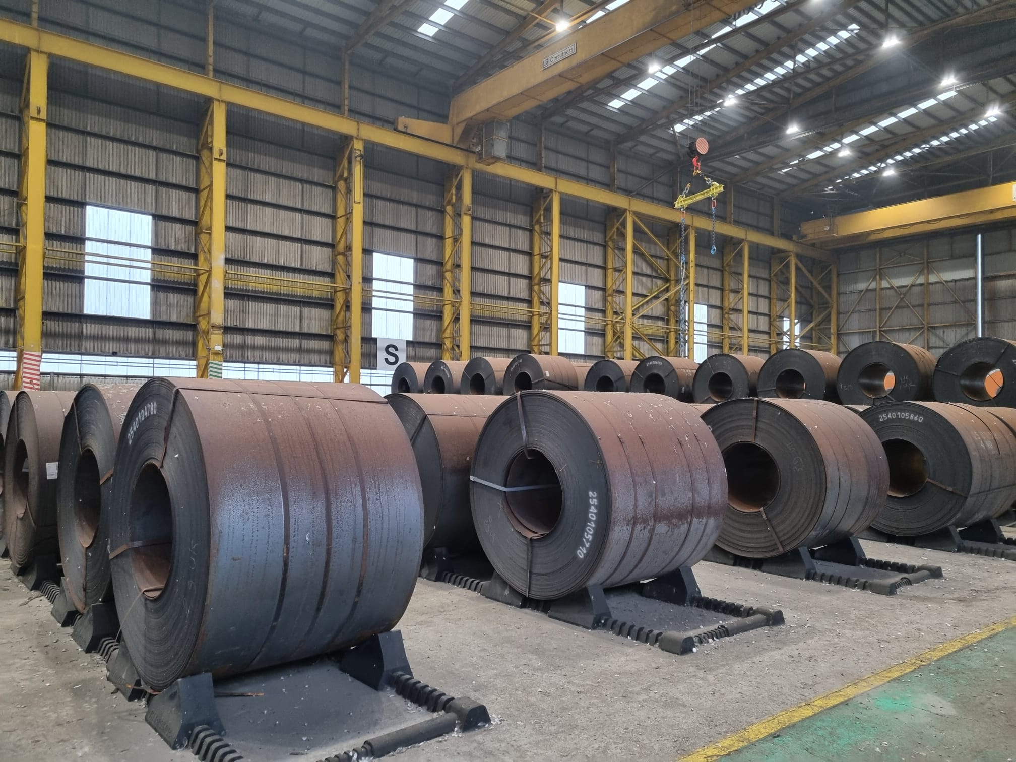 Hot rolled steel coils stored in a steel warehouse